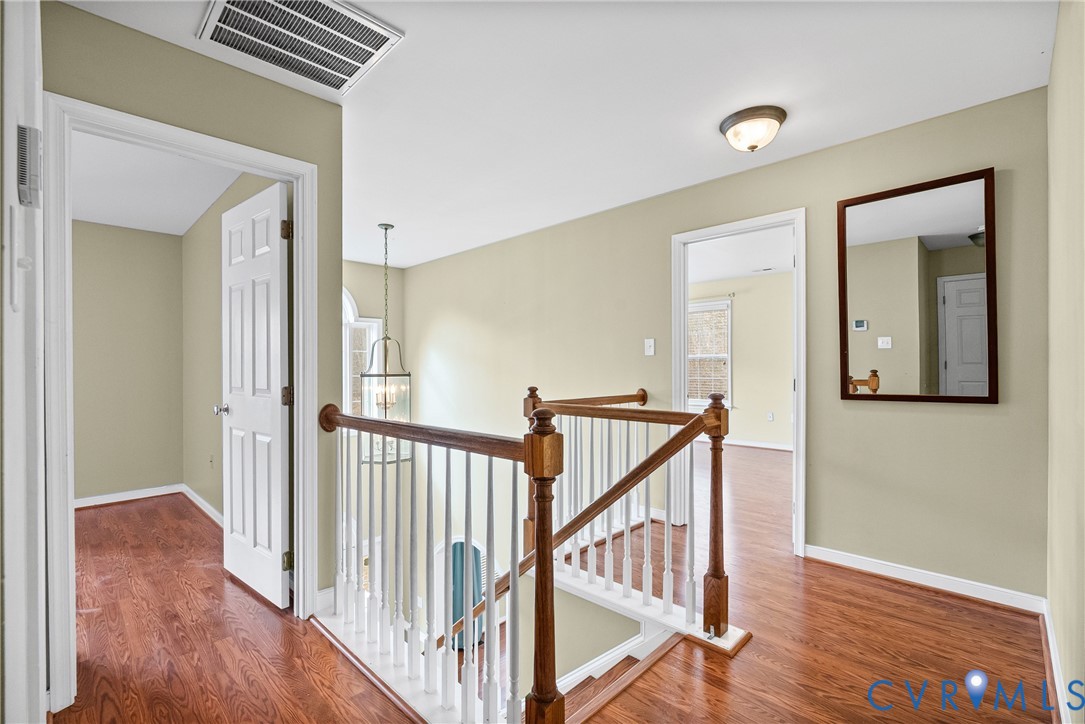 116 Jesse's Way Farmville, VA 23901 - Photo 19 of 47 a view of a hallway with wooden floor and stairs