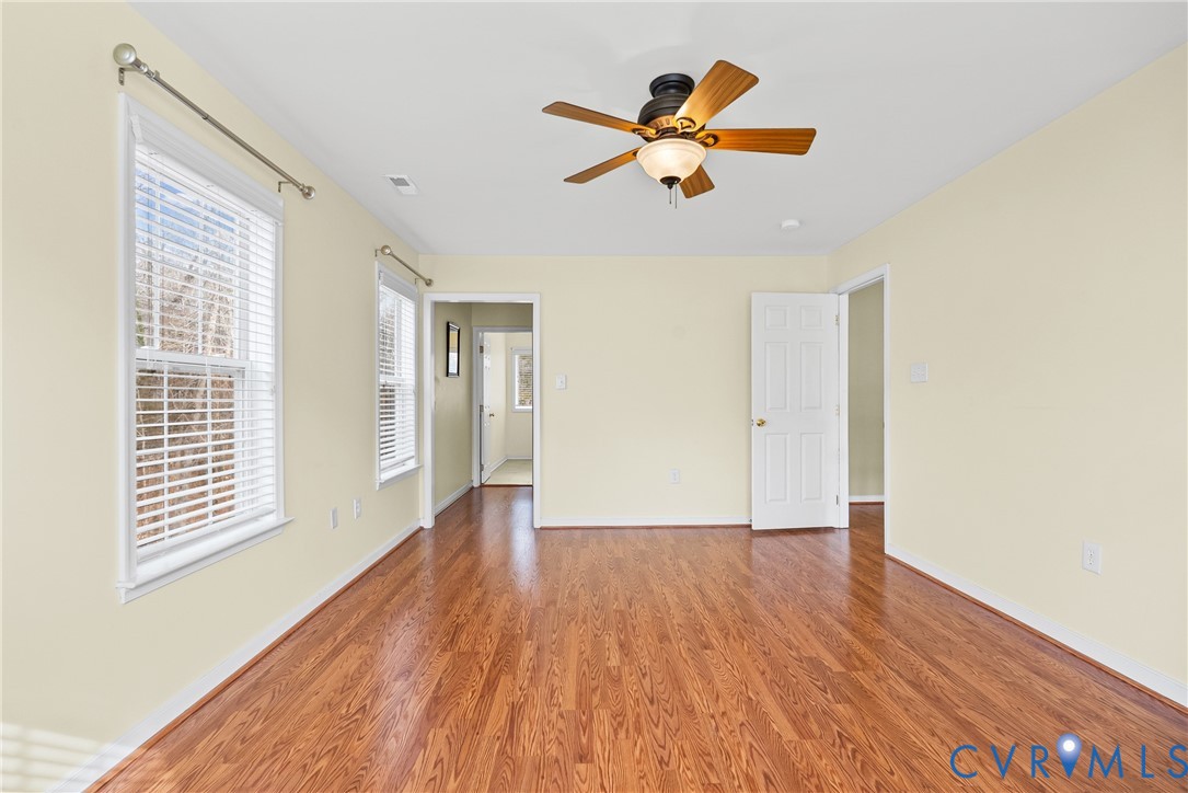 116 Jesse's Way Farmville, VA 23901 - Photo 22 of 47 a view of an empty room with wooden floor and a window