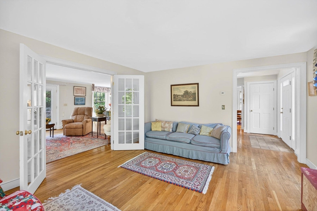 36 Tar Kiln Road Orleans, MA 02653 - Photo 18 of 42 a living room with furniture and a rug