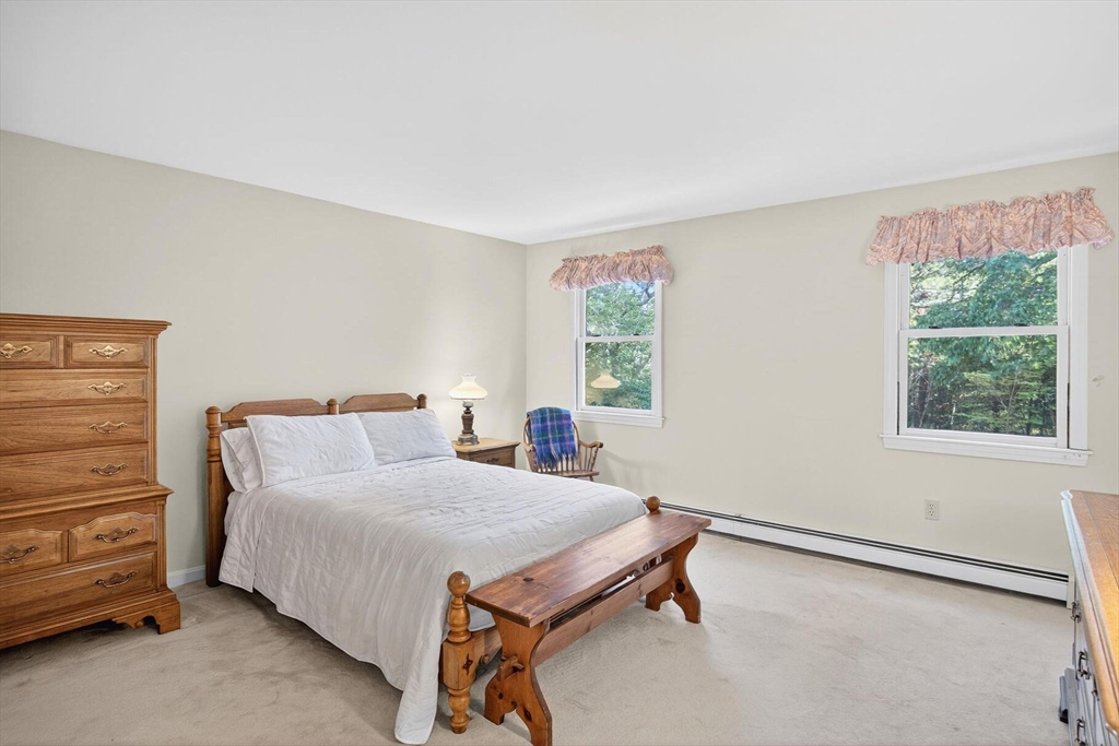 36 Tar Kiln Road Orleans, MA 02653 - Photo 24 of 42 a bedroom with a bed and a window
