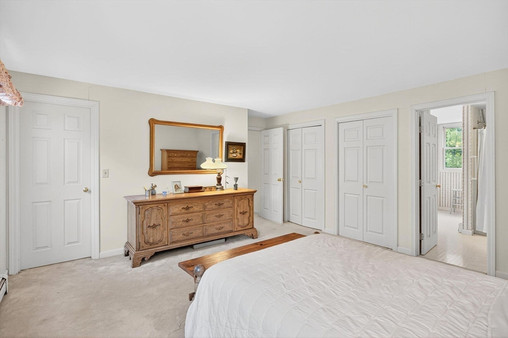 36 Tar Kiln Road Orleans, MA 02653 - Photo 26 of 42 a bedroom with a bed and a dresser