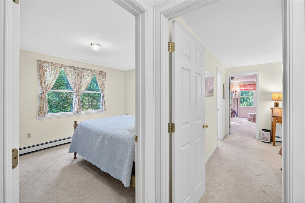 36 Tar Kiln Road Orleans, MA 02653 - Photo 29 of 42 a bed room with a bed and a window