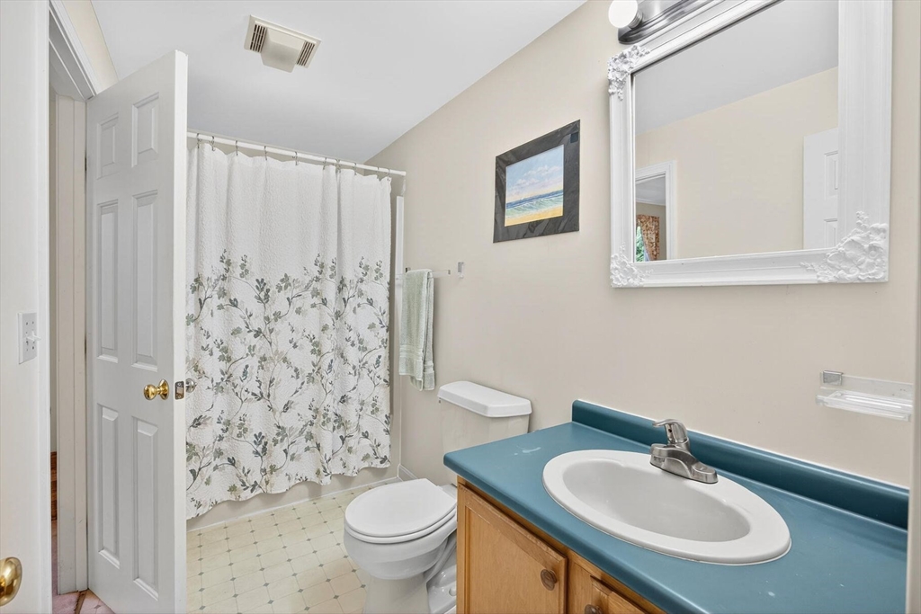 36 Tar Kiln Road Orleans, MA 02653 - Photo 33 of 42 a bathroom with a sink toilet and shower
