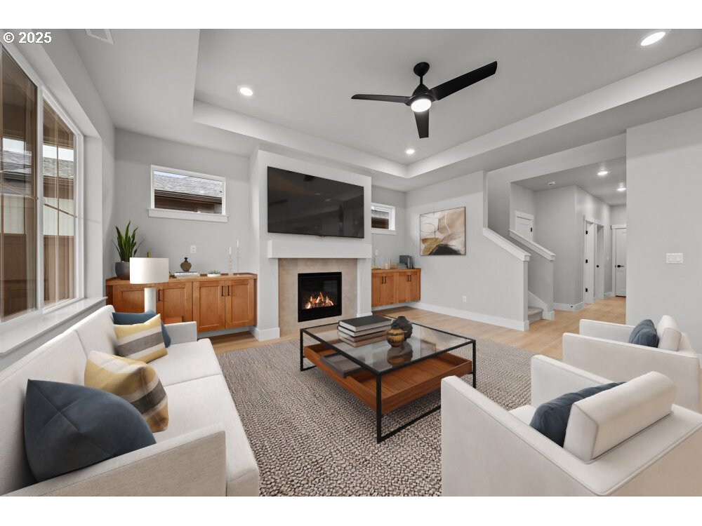 2481 North Villa Road Newberg, OR 97132 - Photo 2 of 11 a living room with furniture a fireplace and a flat screen tv
