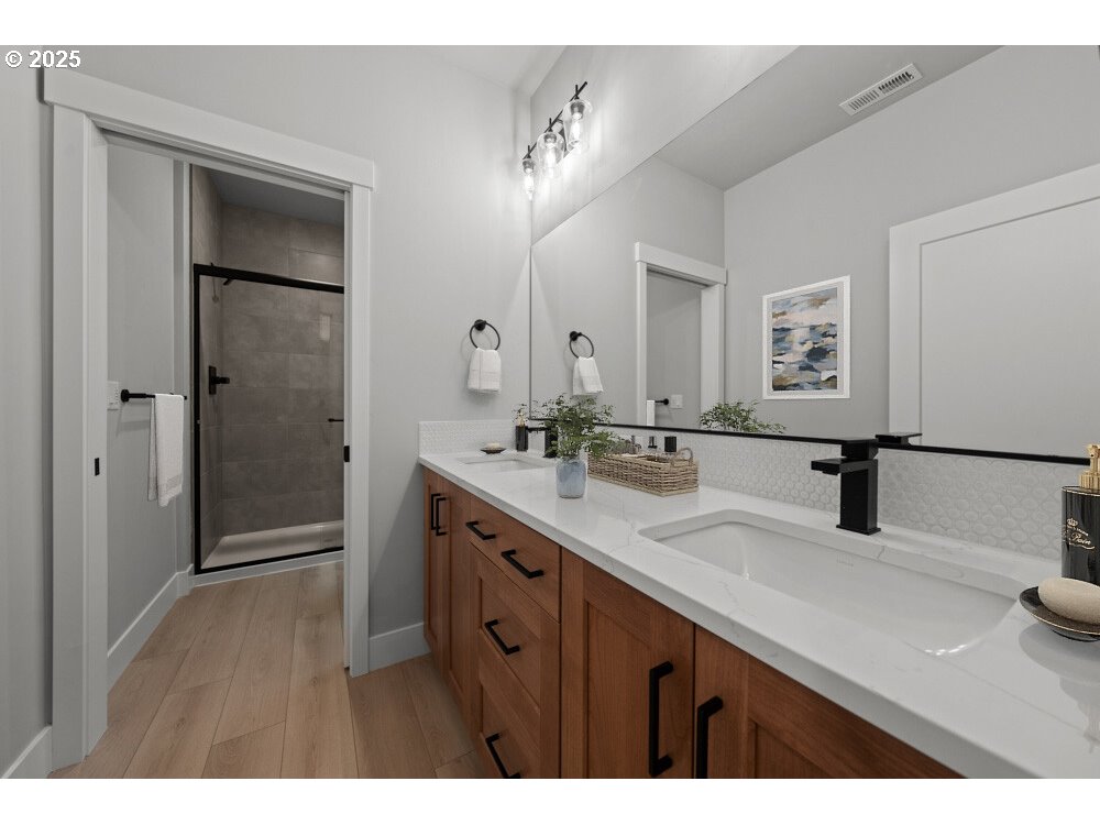 2481 North Villa Road Newberg, OR 97132 - Photo 6 of 11 a bathroom with a double vanity sink mirror and double