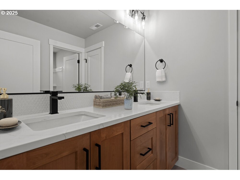 2481 North Villa Road Newberg, OR 97132 - Photo 9 of 11 a bathroom with a sink and a mirror