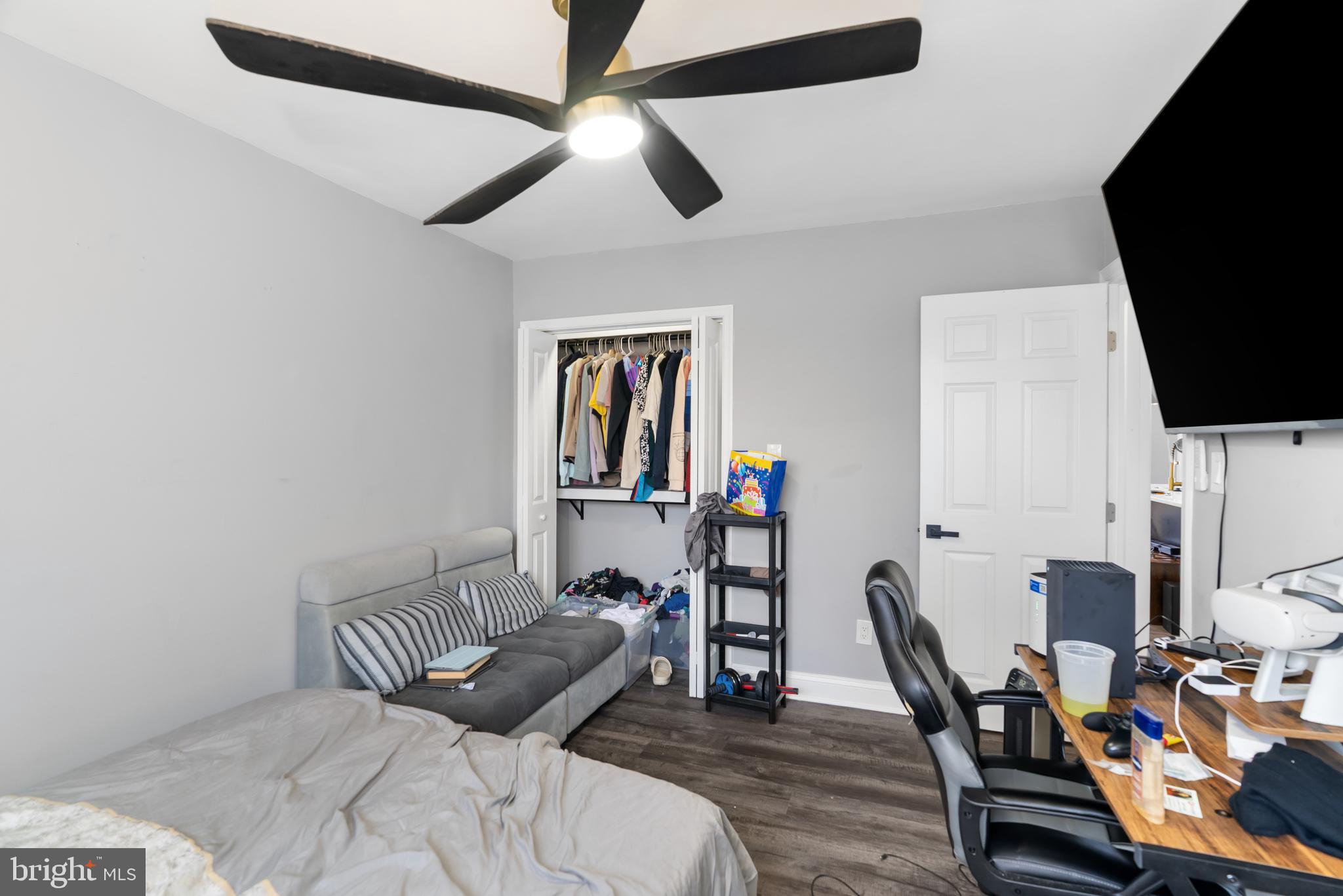 182 Joliet Street Washington, DC 20032 - Photo 15 of 49 a work room with furniture and a flat screen tv
