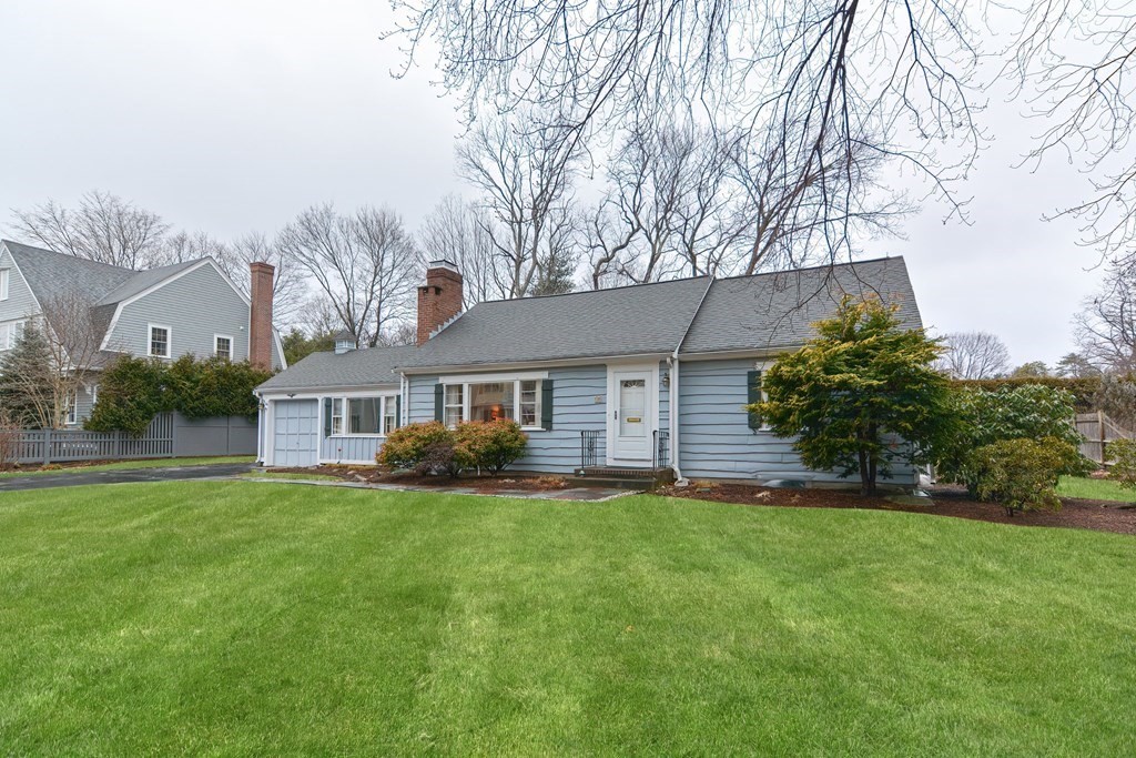 44 Chesterton Road Wellesley, MA 02481 - Photo 1 of 24 a front view of house with yard and green space
