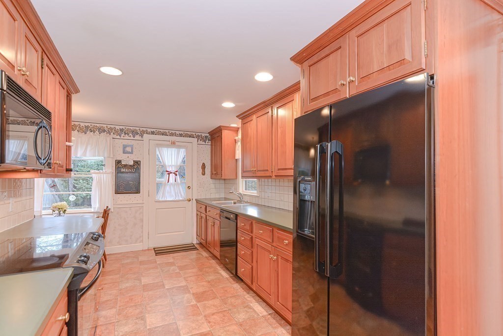 44 Chesterton Road Wellesley, MA 02481 - Photo 11 of 24 a large kitchen with a large window