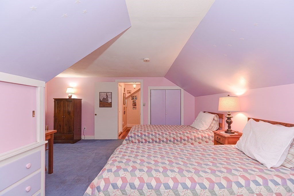44 Chesterton Road Wellesley, MA 02481 - Photo 18 of 24 a bedroom with a large bed and a closet