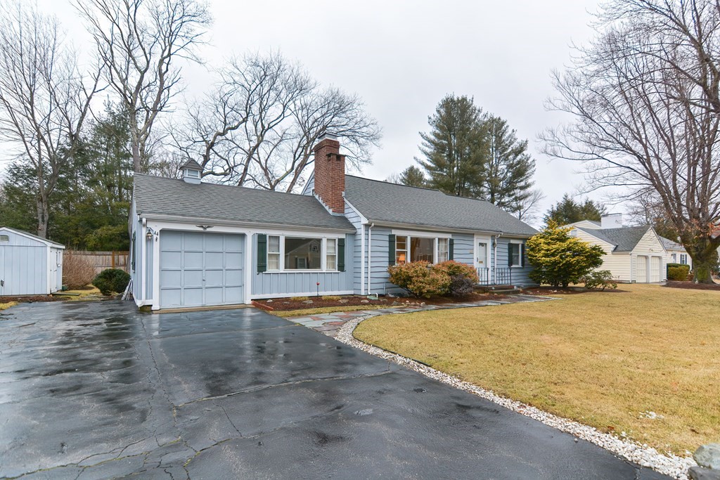 44 Chesterton Road Wellesley, MA 02481 - Photo 24 of 24 a front view of a house with a yard and garage