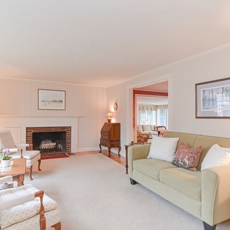 44 Chesterton Road Wellesley, MA 02481 - Photo 6 of 24 a living room with furniture and a fireplace