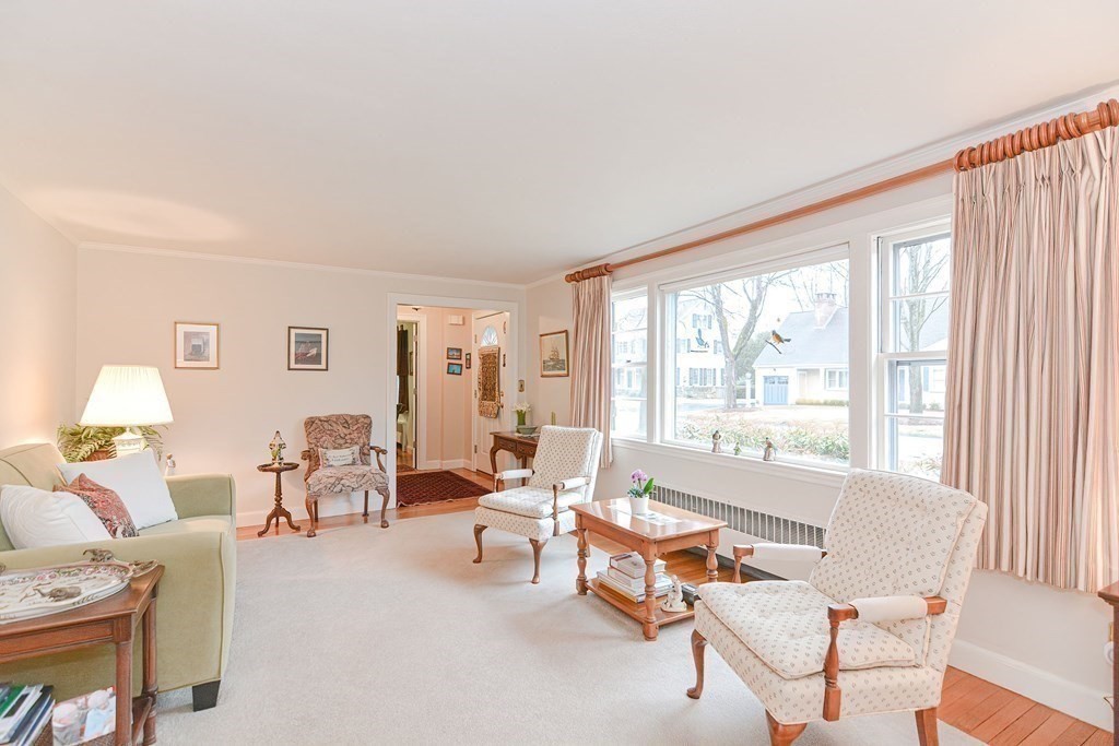 44 Chesterton Road Wellesley, MA 02481 - Photo 7 of 24 a living room with furniture and a large window