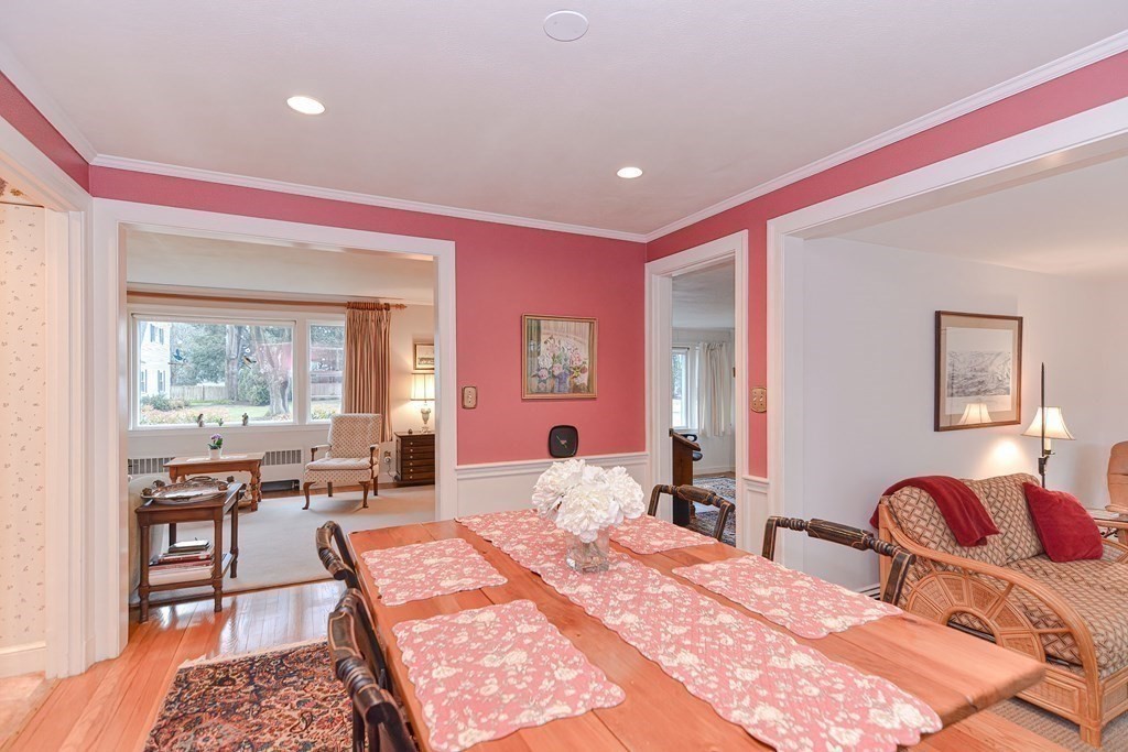 44 Chesterton Road Wellesley, MA 02481 - Photo 8 of 24 a bedroom with a bed and wooden floor