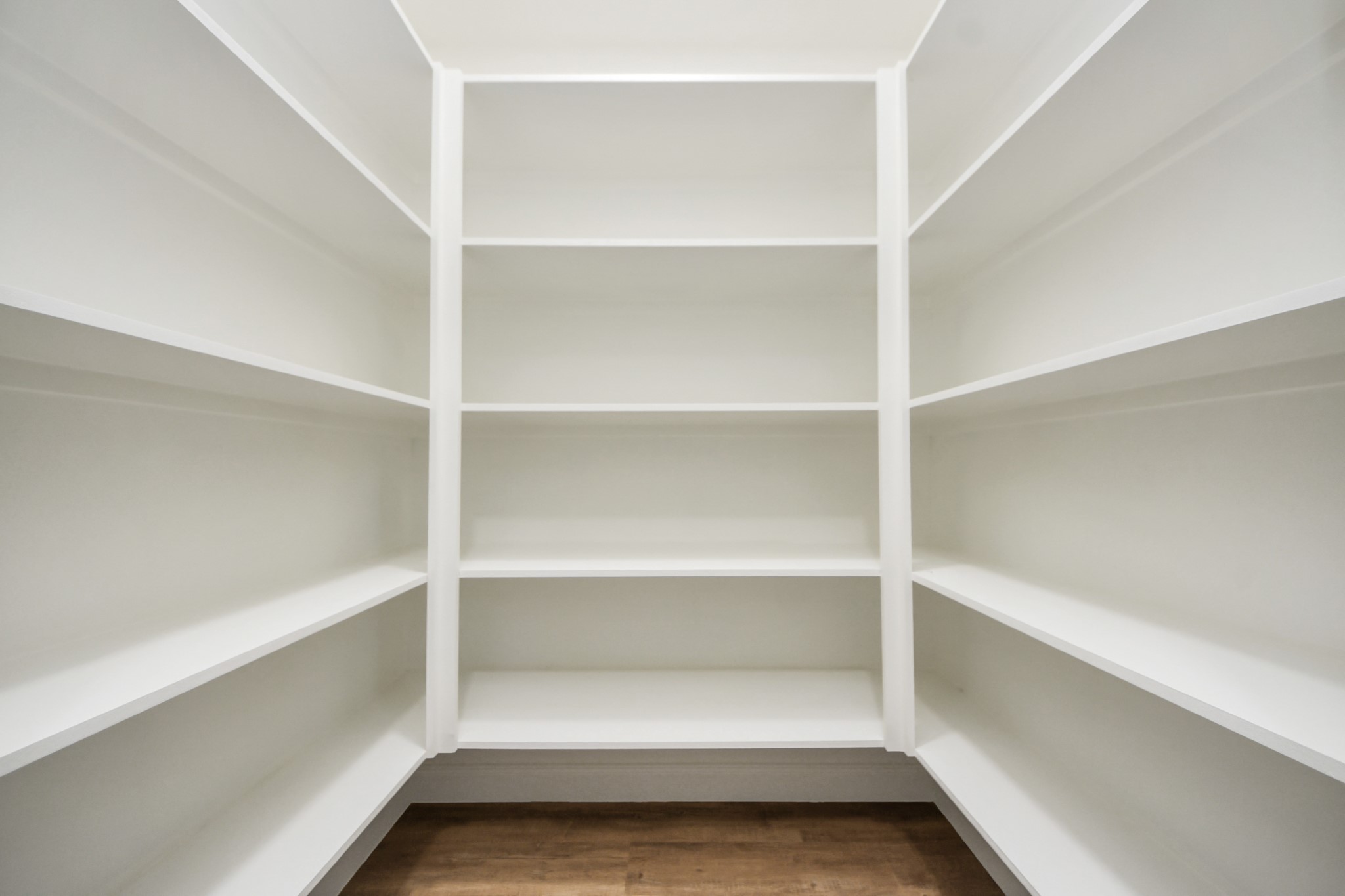 1737 Tabor Street Houston, TX 77009 - Photo 22 of 46 A generous walk-in pantry designed for both function and style—crisp white shelving keeps everything neatly in place