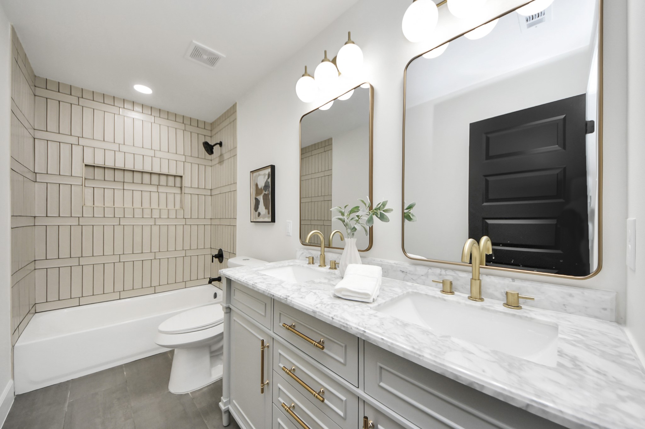 1737 Tabor Street Houston, TX 77009 - Photo 33 of 46 a bathroom with a granite countertop toilet sink and mirror