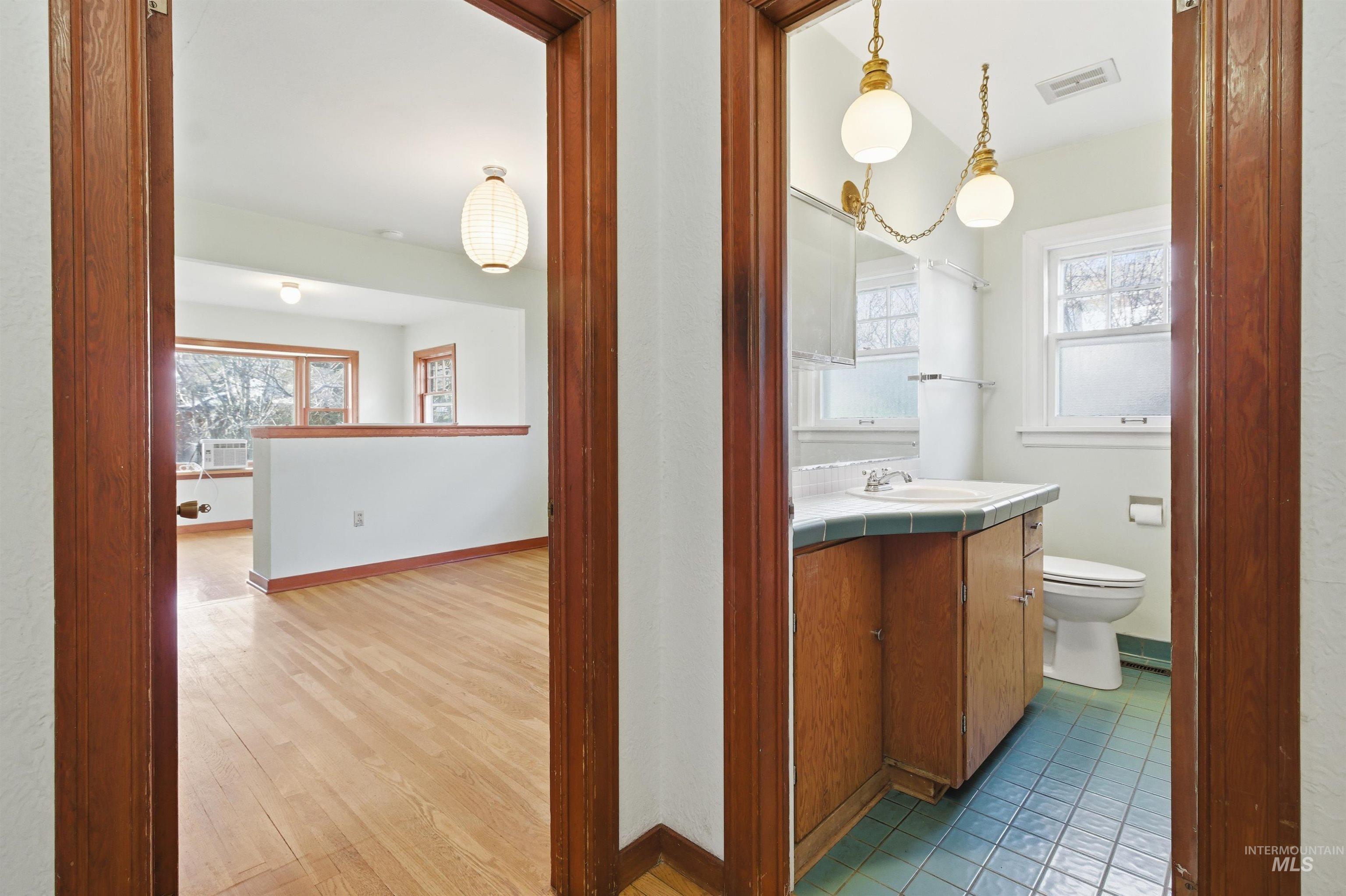 1117 East 6th Street Moscow, ID 83843 - Photo 27 of 46 Bathroom featuring vanity and light wood-type flooring