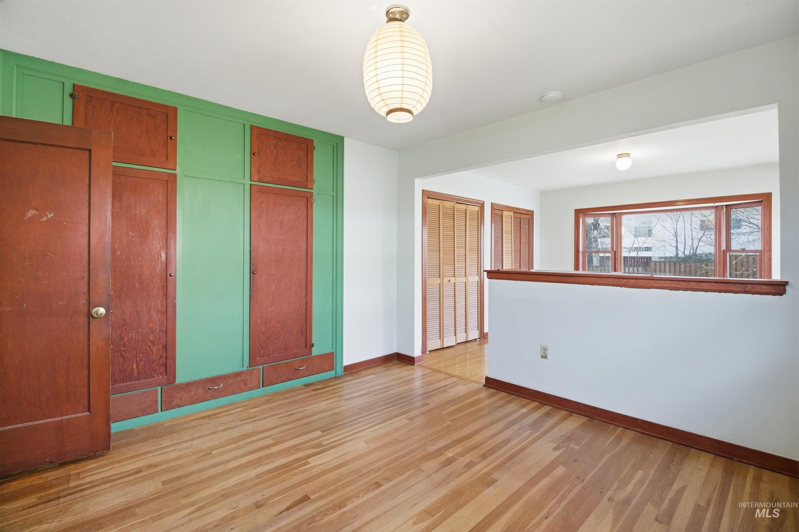 1117 East 6th Street Moscow, ID 83843 - Photo 29 of 46 Spare room with light wood-type flooring and baseboards