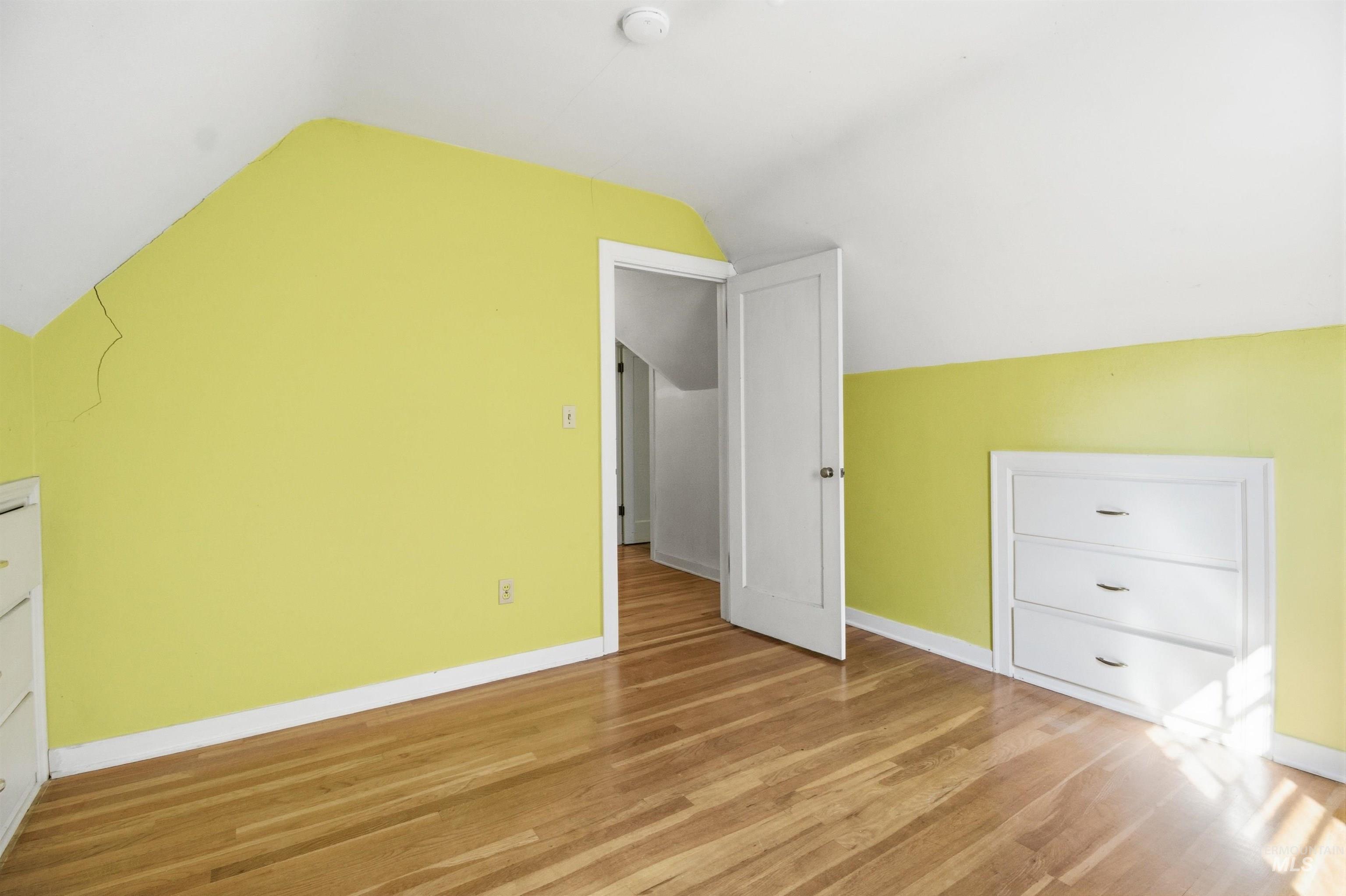 1117 East 6th Street Moscow, ID 83843 - Photo 43 of 46 Additional living space featuring light wood-style flooring and lofted ceiling