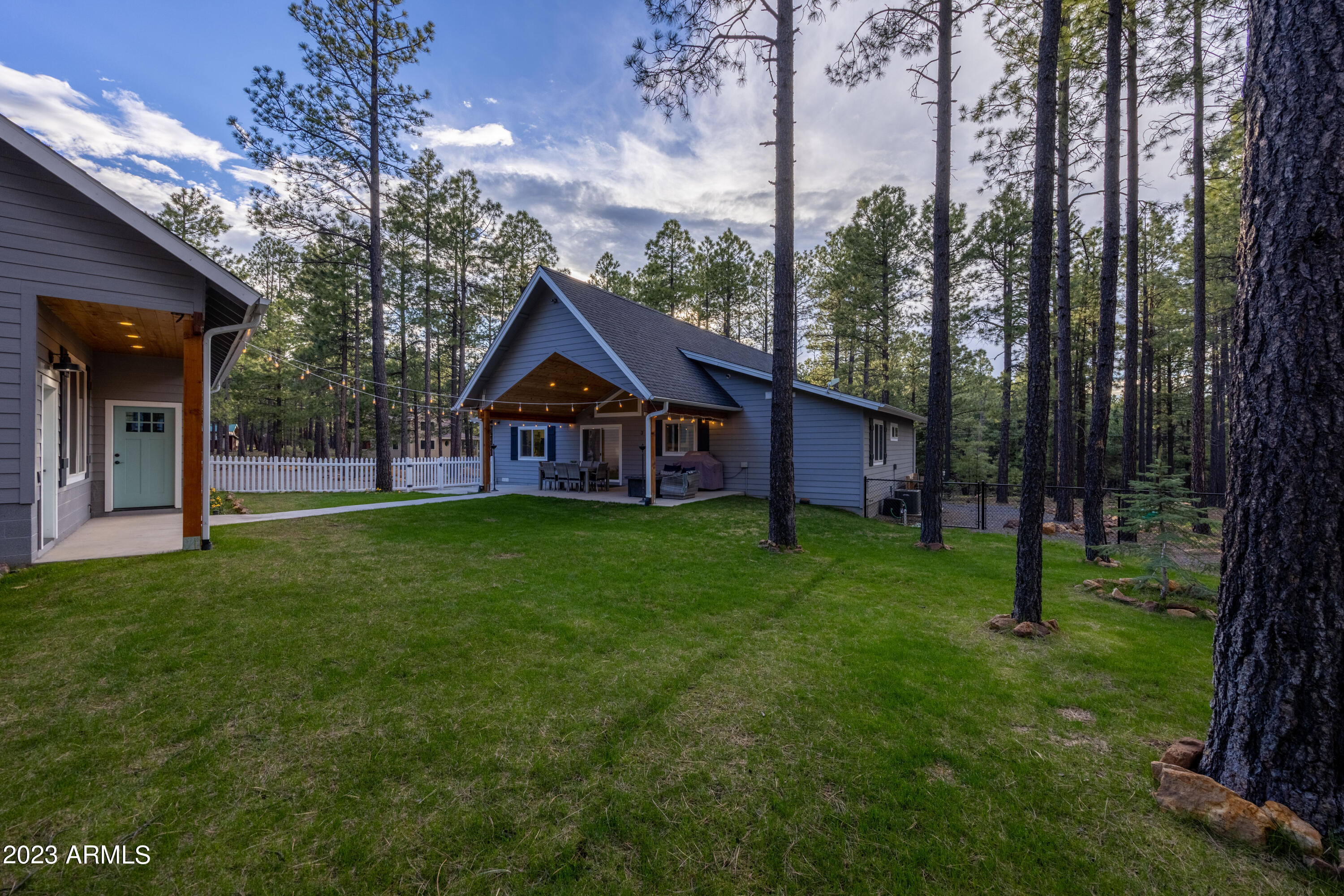 2772 Larson Loop Forest Lakes, AZ 85931 - Photo 47 of 65 a front view of a house with garden