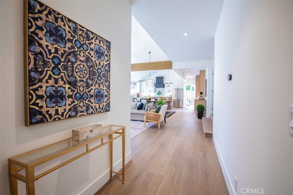 32052 Via Alicia San Juan Capistrano, CA 92675 - Photo 16 of 39 a living room with furniture and a wooden floor