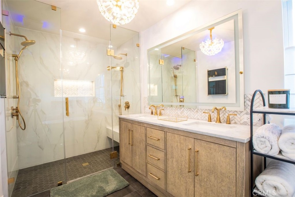 32052 Via Alicia San Juan Capistrano, CA 92675 - Photo 20 of 39 a bathroom with a double vanity sink mirror and