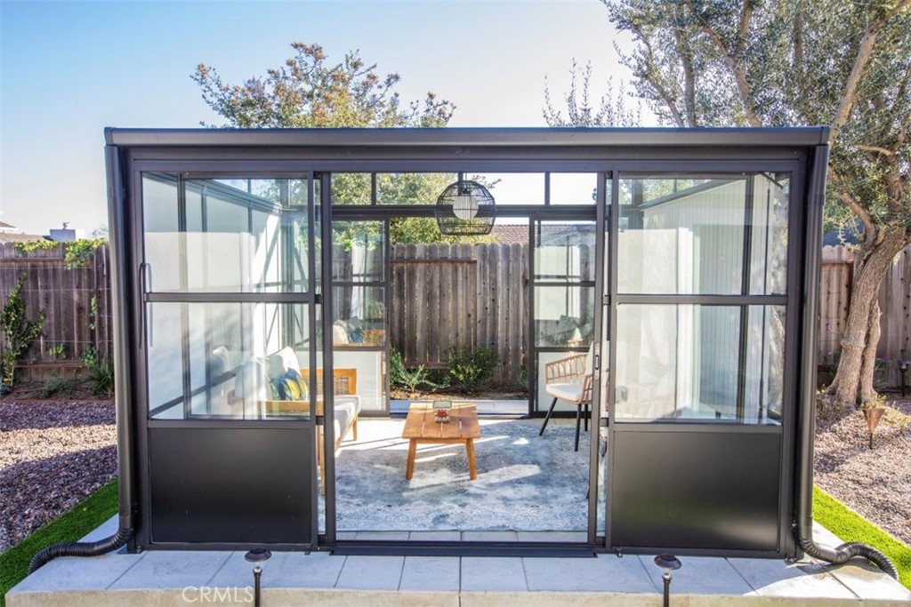 32052 Via Alicia San Juan Capistrano, CA 92675 - Photo 10 of 39 Exterior glasshouse and outdoor living space off of family room.
