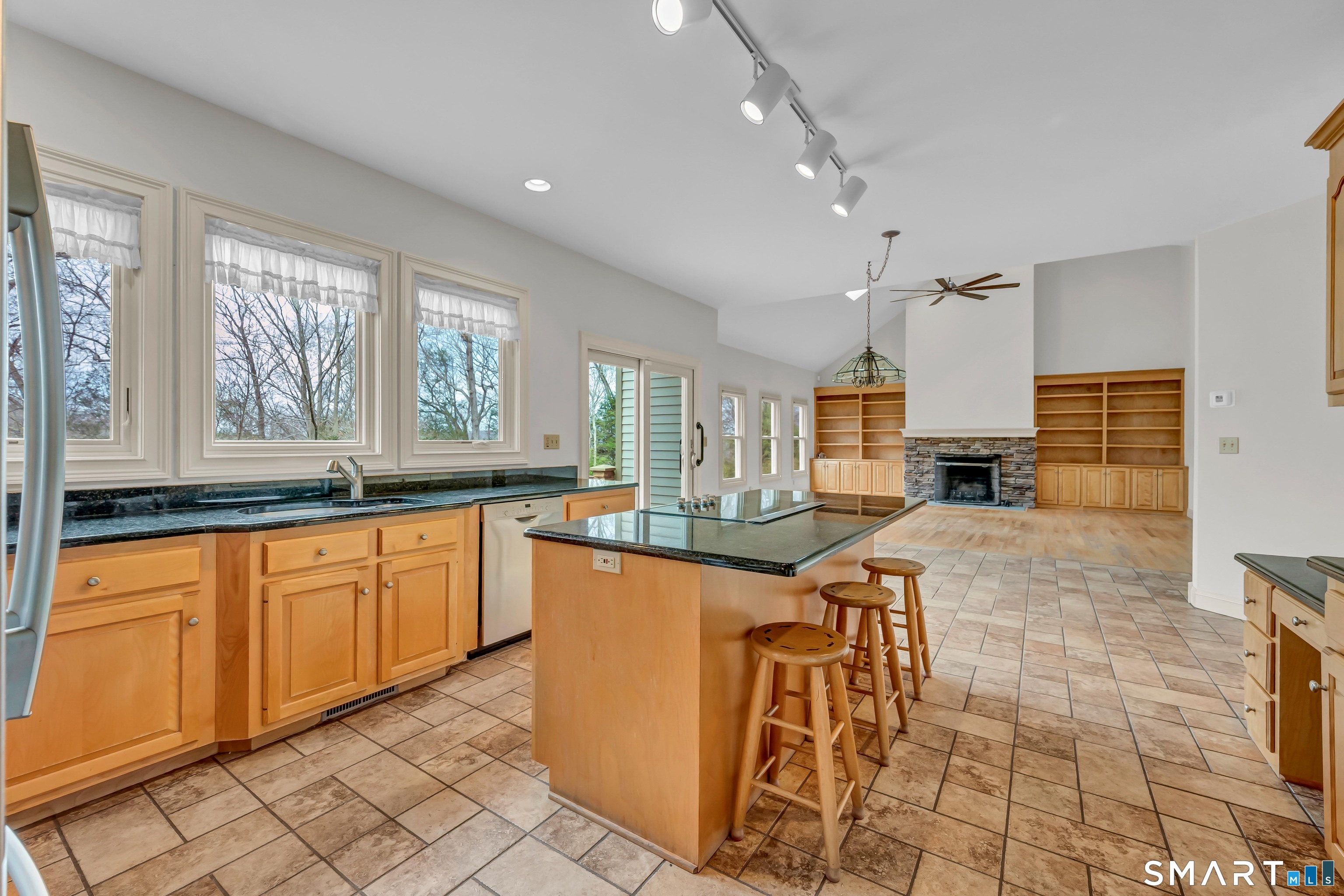 201 Grey Rock Road Southbury, CT 06488 - Photo 10 of 40 Shows open flow between kitchen and family room - very spacious