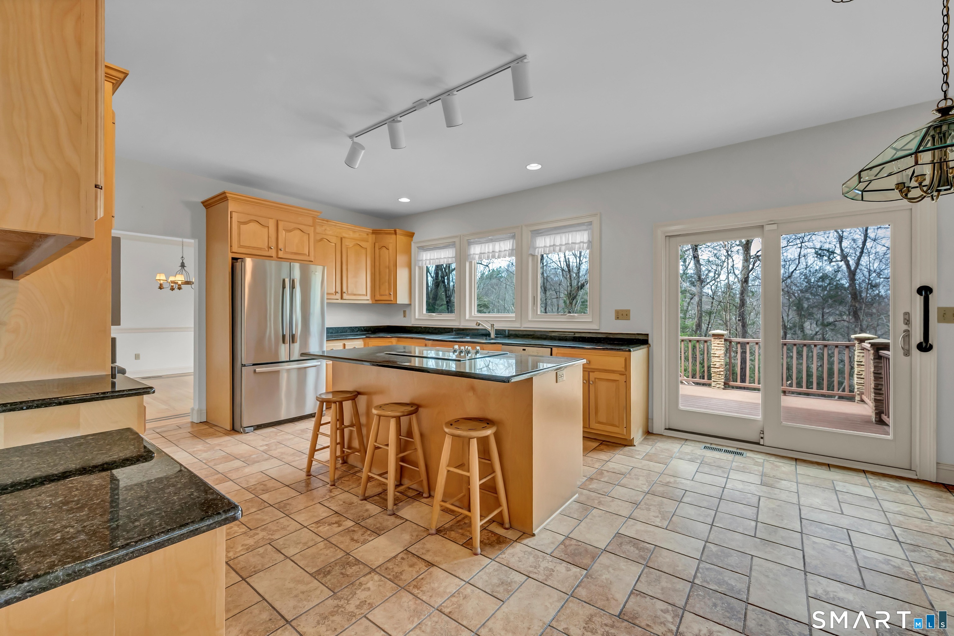201 Grey Rock Road Southbury, CT 06488 - Photo 13 of 40 Large eat-in kitchen with "Alberta" Granite, center island and stainless steel appliances