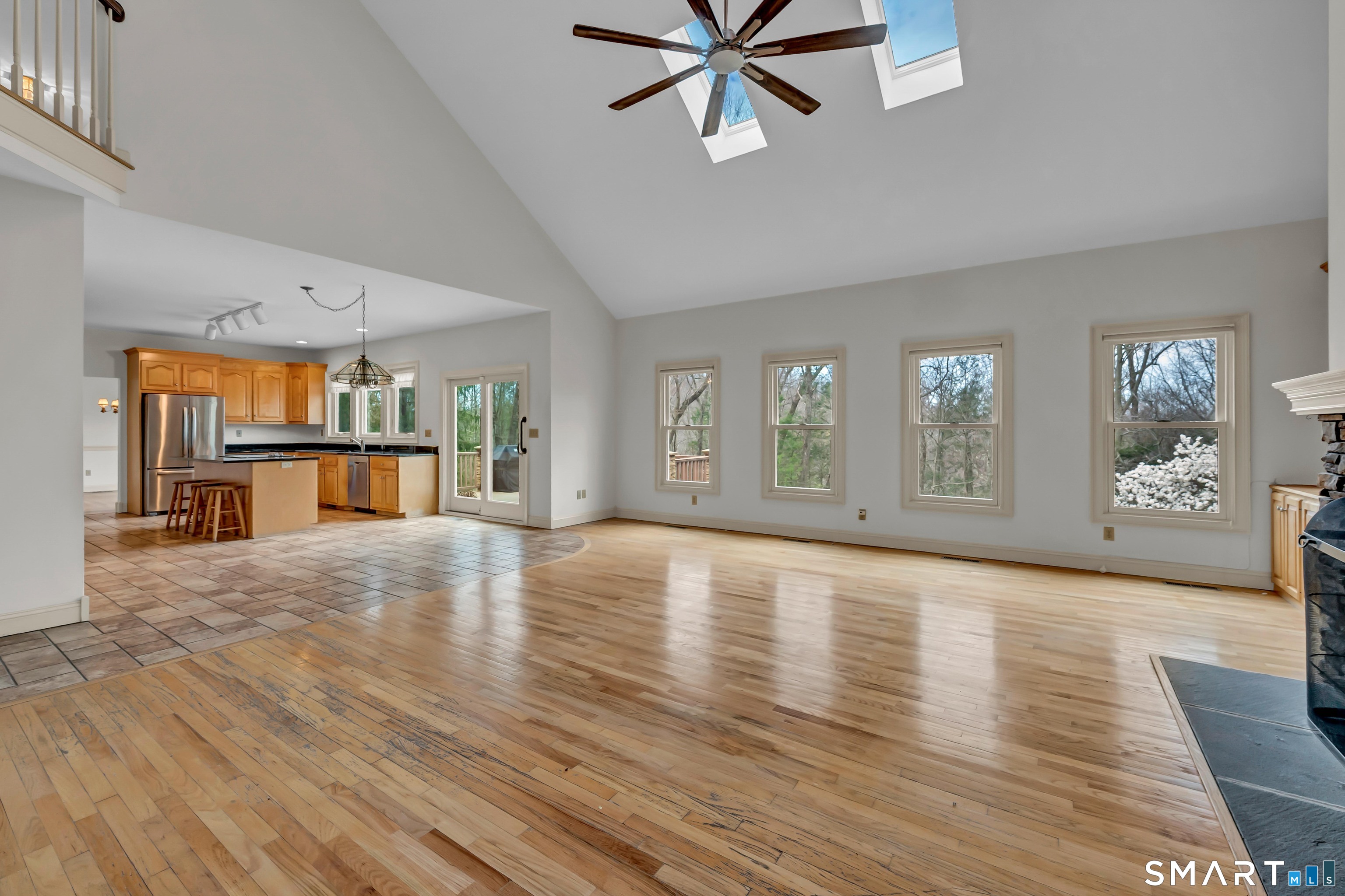 201 Grey Rock Road Southbury, CT 06488 - Photo 15 of 40 20 ft Cathedral ceilings in family room with 4 skylights and ceiling fan