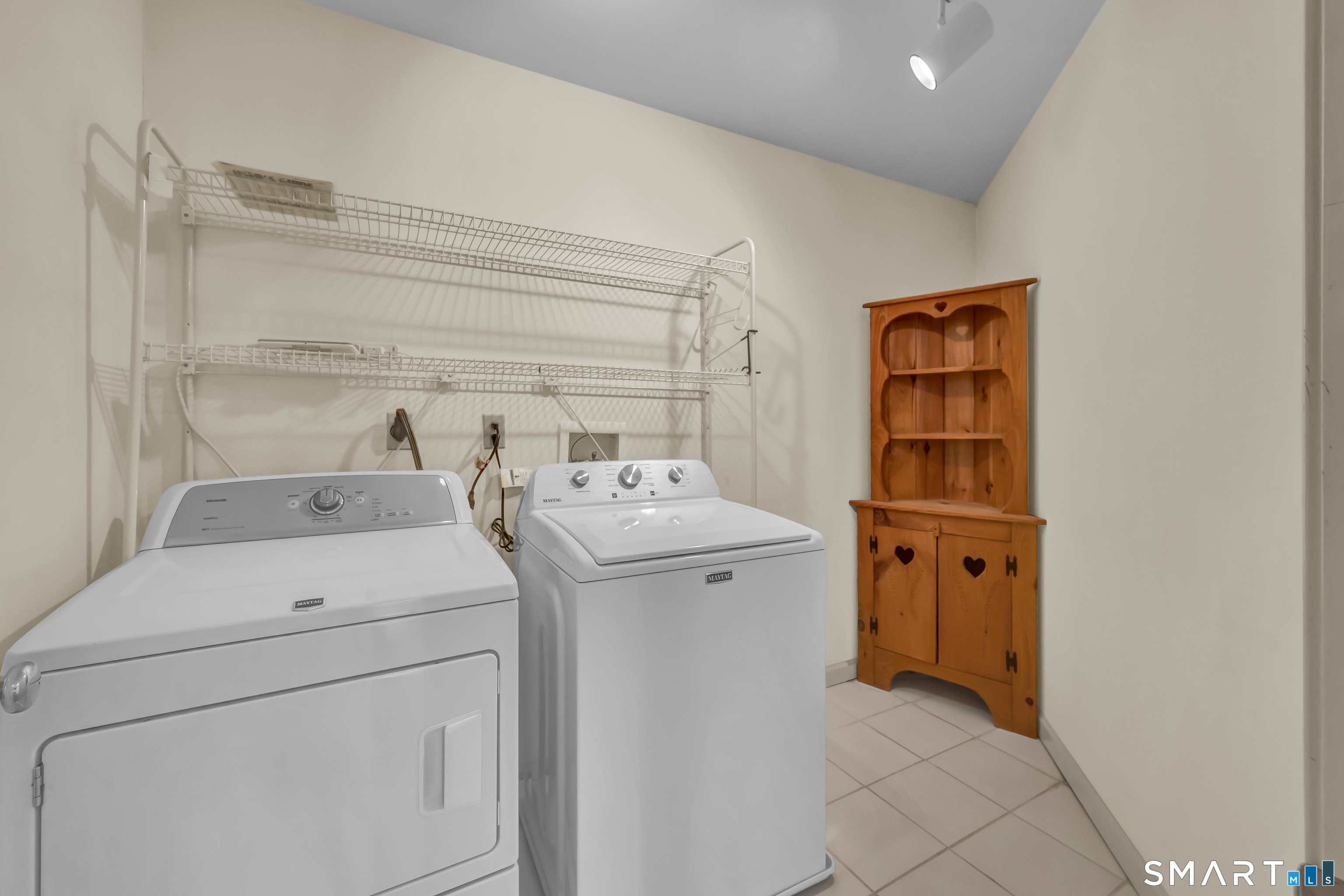 201 Grey Rock Road Southbury, CT 06488 - Photo 26 of 40 2nd Floor Laundry with cupboard