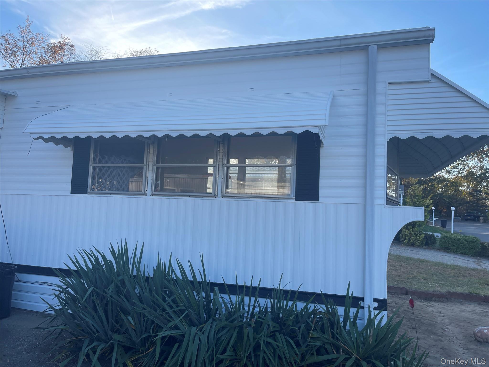 1661 Old Country Road, Unit 308 Riverhead, NY 11901 - Photo 10 of 10 a view of front door