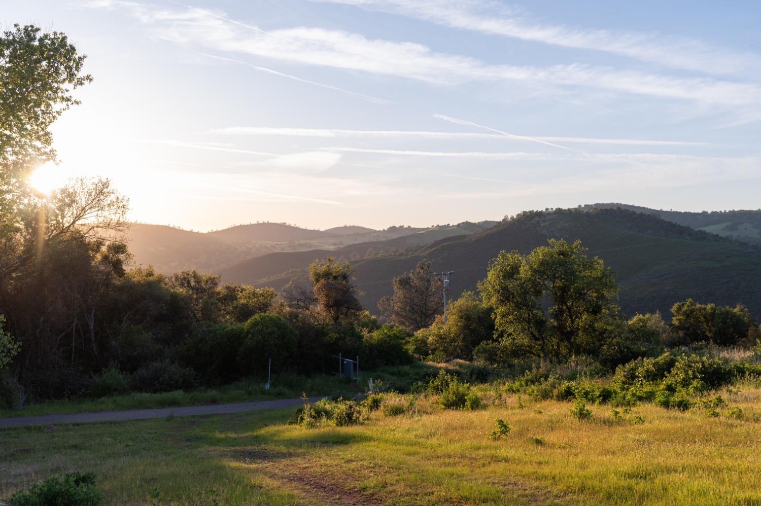1940 Dorado Ridge Trail Rescue, CA 95672 - Photo 21 of 24 a view of a lake with mountains in the background