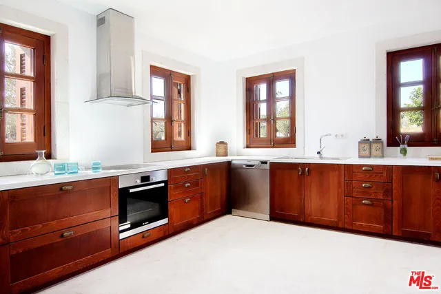 a view of a swimming pool with a lounge chairs