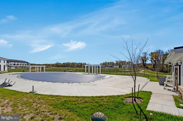 a view of a lake with a big yard