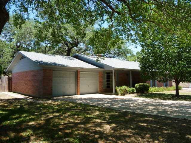 3704 Northfield Road Austin, TX 78727 - Photo 1 of 1 a backyard of a house with yard and tree