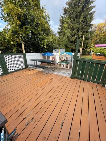 a view of roof deck with patio