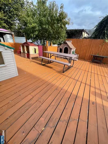 a view of roof deck with patio