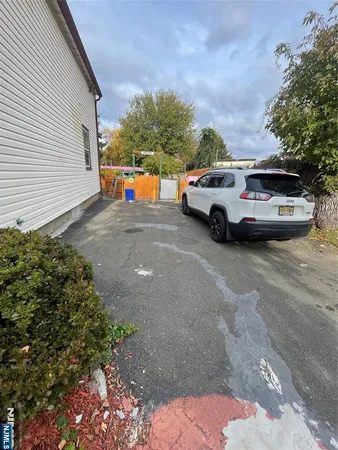 a view of street with parked cars