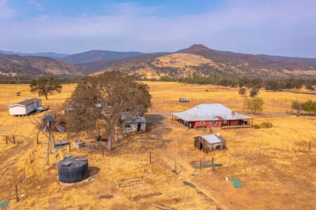 a view of an ocean and a mountain