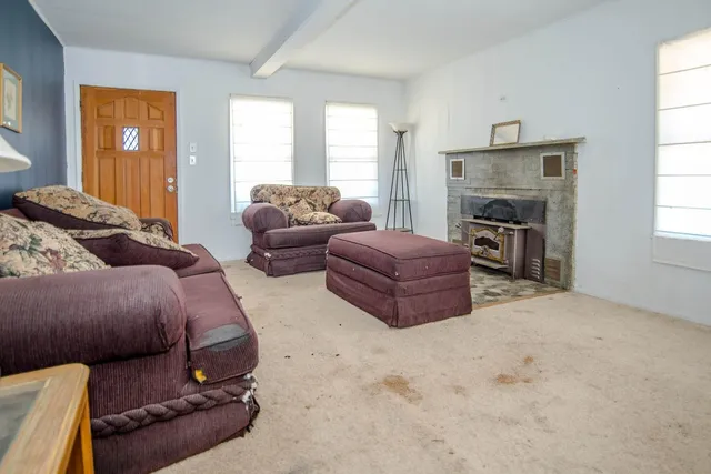 a bathroom with a sink a mirror and a shower