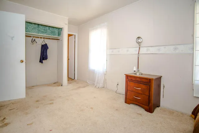 a view of a cafe with sitting area