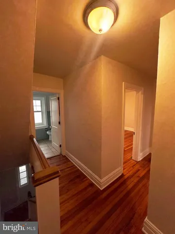 a view of a livingroom with wooden floor