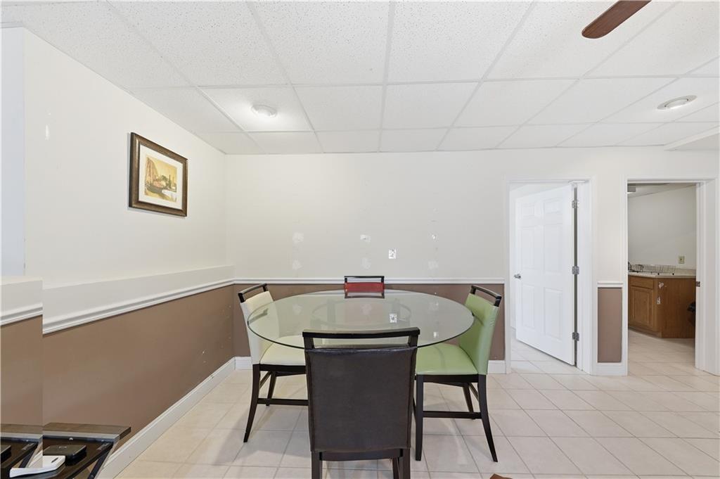 260 Tabor Forest Drive Oxford, GA 30054 - Photo 11 of 20 a view of a dining room with furniture and wooden floor