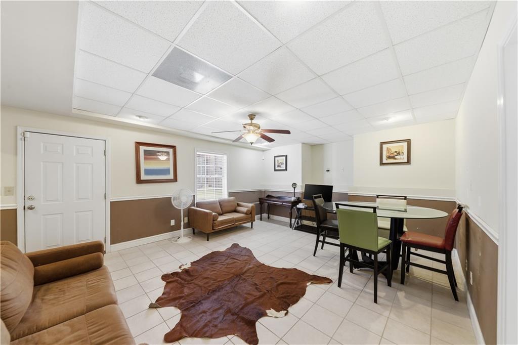 260 Tabor Forest Drive Oxford, GA 30054 - Photo 6 of 20 a living room with furniture wooden floor and a window