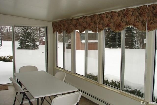 1426 Pebble Creek Road Metamora, MI 48455 - Photo 14 of 24 Heated florida room.jpg