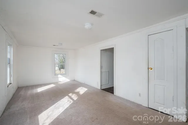a view of a bedroom with window
