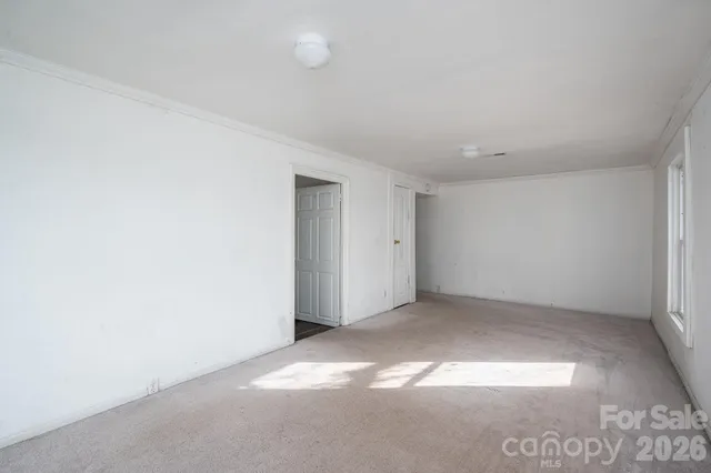 an empty room with a natural light