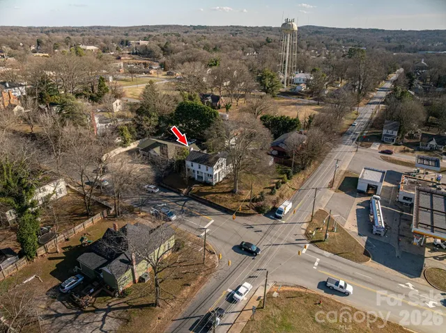 an aerial view of a city with lots of residential buildings