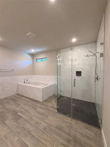 a bathroom with double sink and a mirror